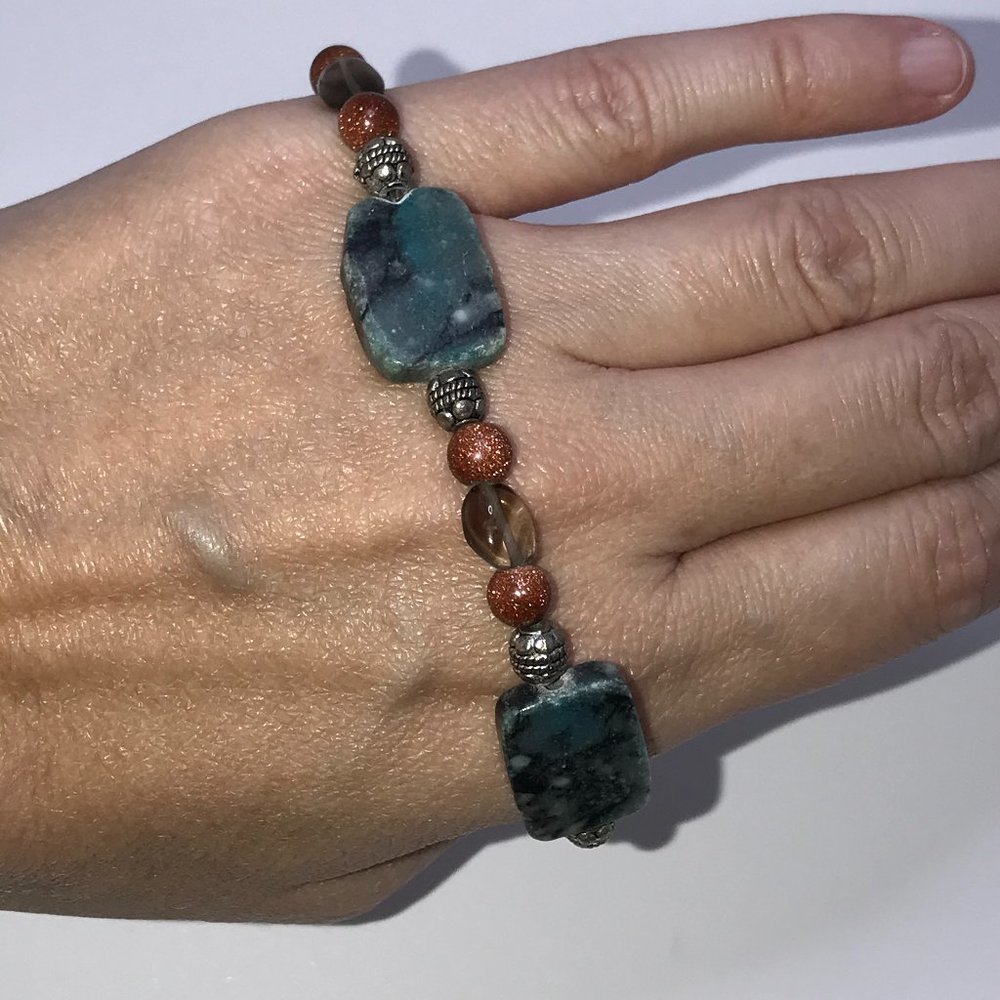 7" Marble, Gold Goldstone And Smoky Quartz Bracelet